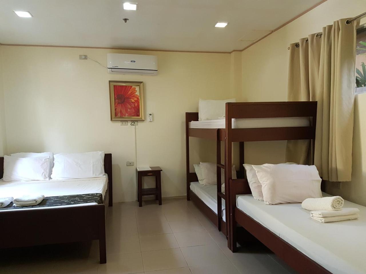 Blue Lagoon Inn & Suites Пуэрто-Принцеса Экстерьер фото